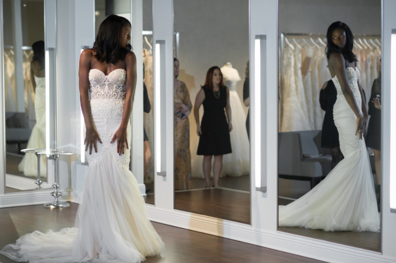 bride trying on Netta Ben Shabu gown at Solutions Bridal