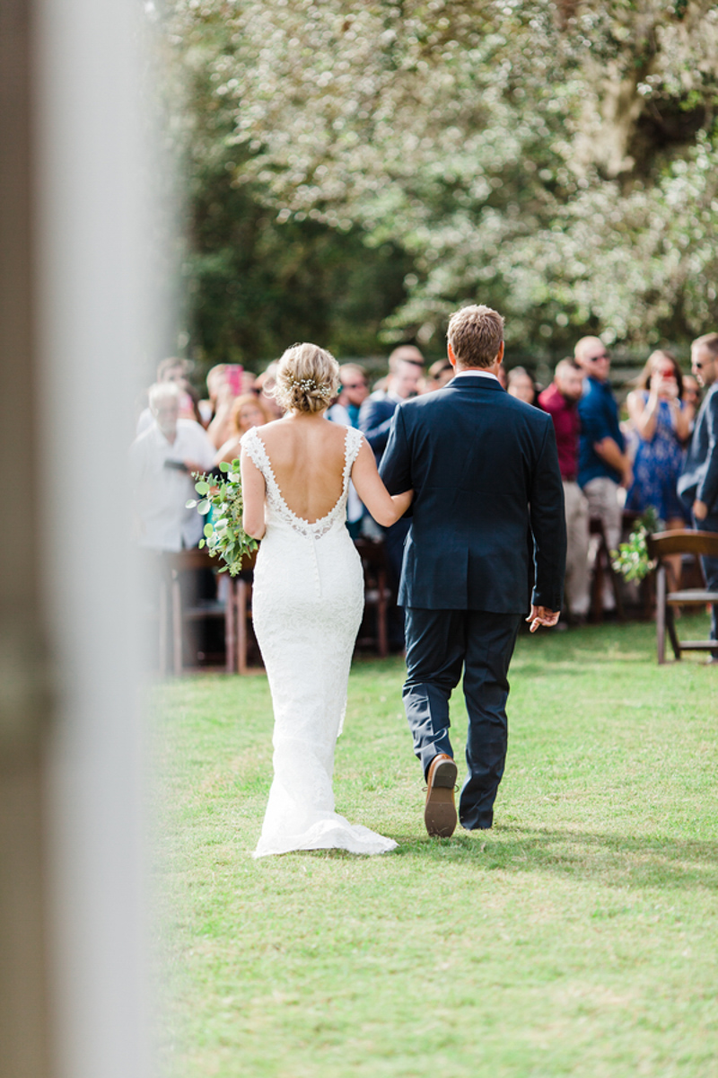 bride with father walking down the aisle