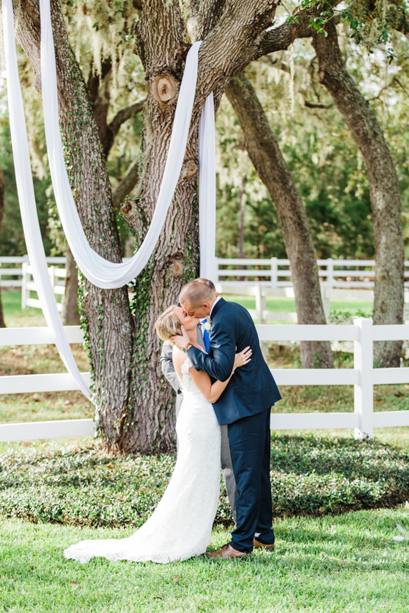 couple kissing after wedding ceremony at Bramble Tree Estate