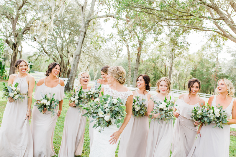 bride and bridesmaids in light mauve dresses