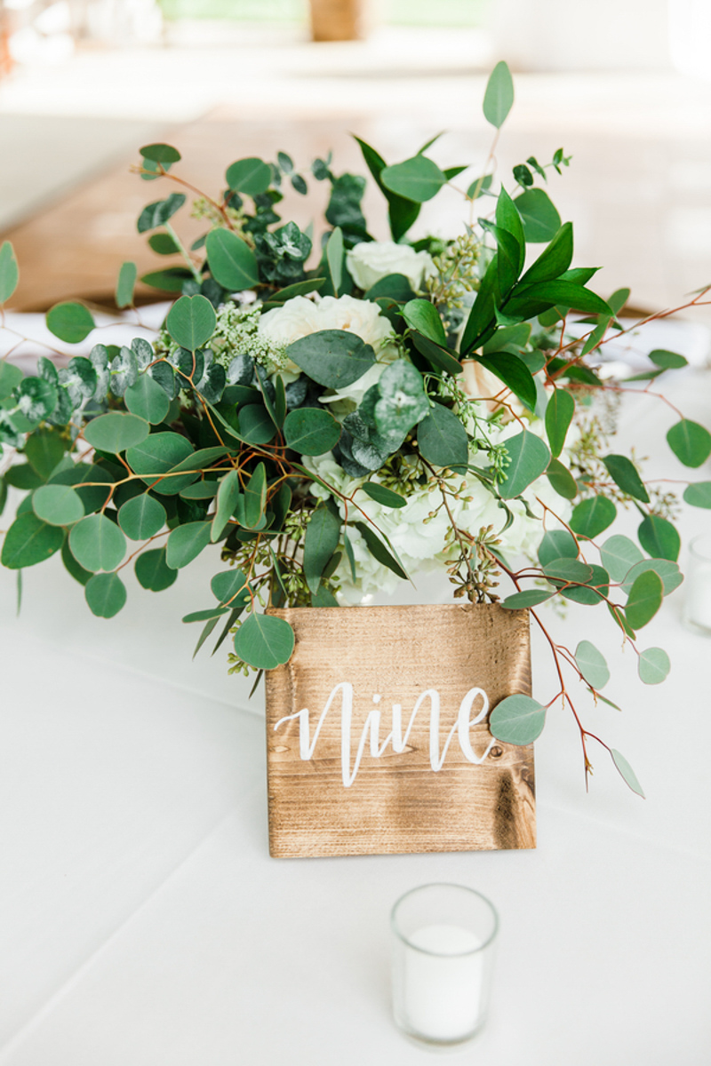 rustic wooding wedding table number on table