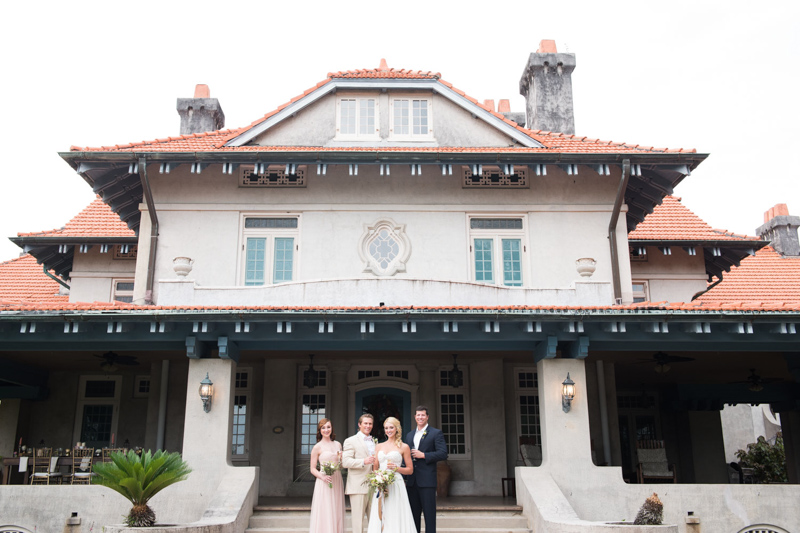 bridal party standing in front of the Sydonie Mansion