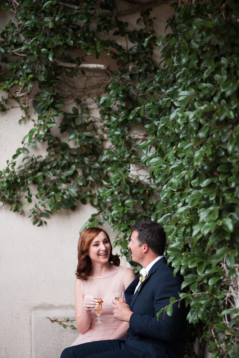 maid of honor and best man laughing