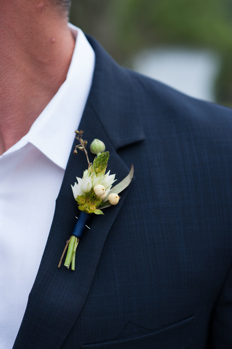 best man's white and green boutonniere
