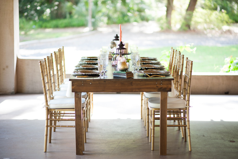 farm table with gold chiavari chair on Sydonie Mansion's porch