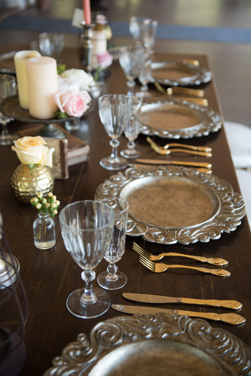 Old World chargers on farm table