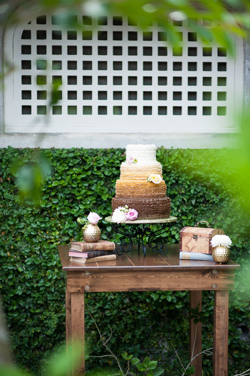 ombre wedding cake on square farm table