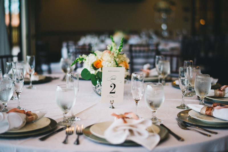 black guest table number on reception table