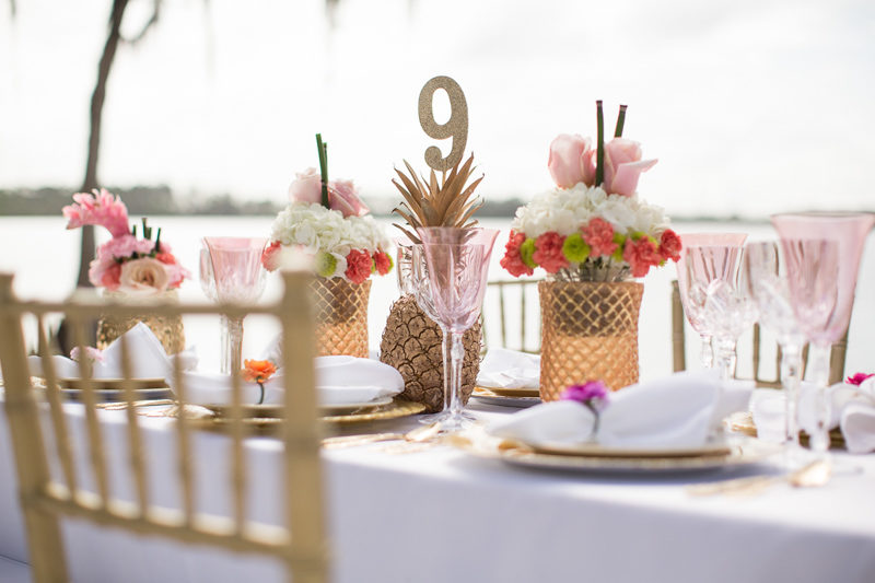 gold wedding table number in a golden pineapple