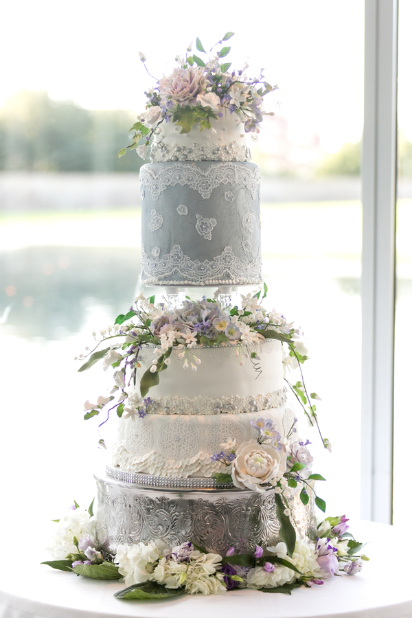 Gray and white ornate wedding cake