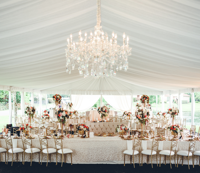 Blush and gold tented wedding reception space