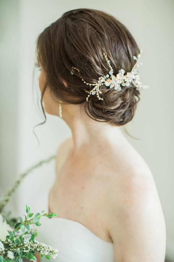 Bridal updo with crystal accessory