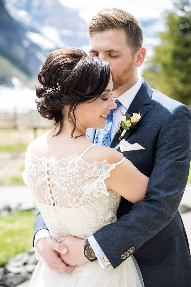 Lake Louise wedding elopement, bride and groom outdoor portraits, mountain wedding