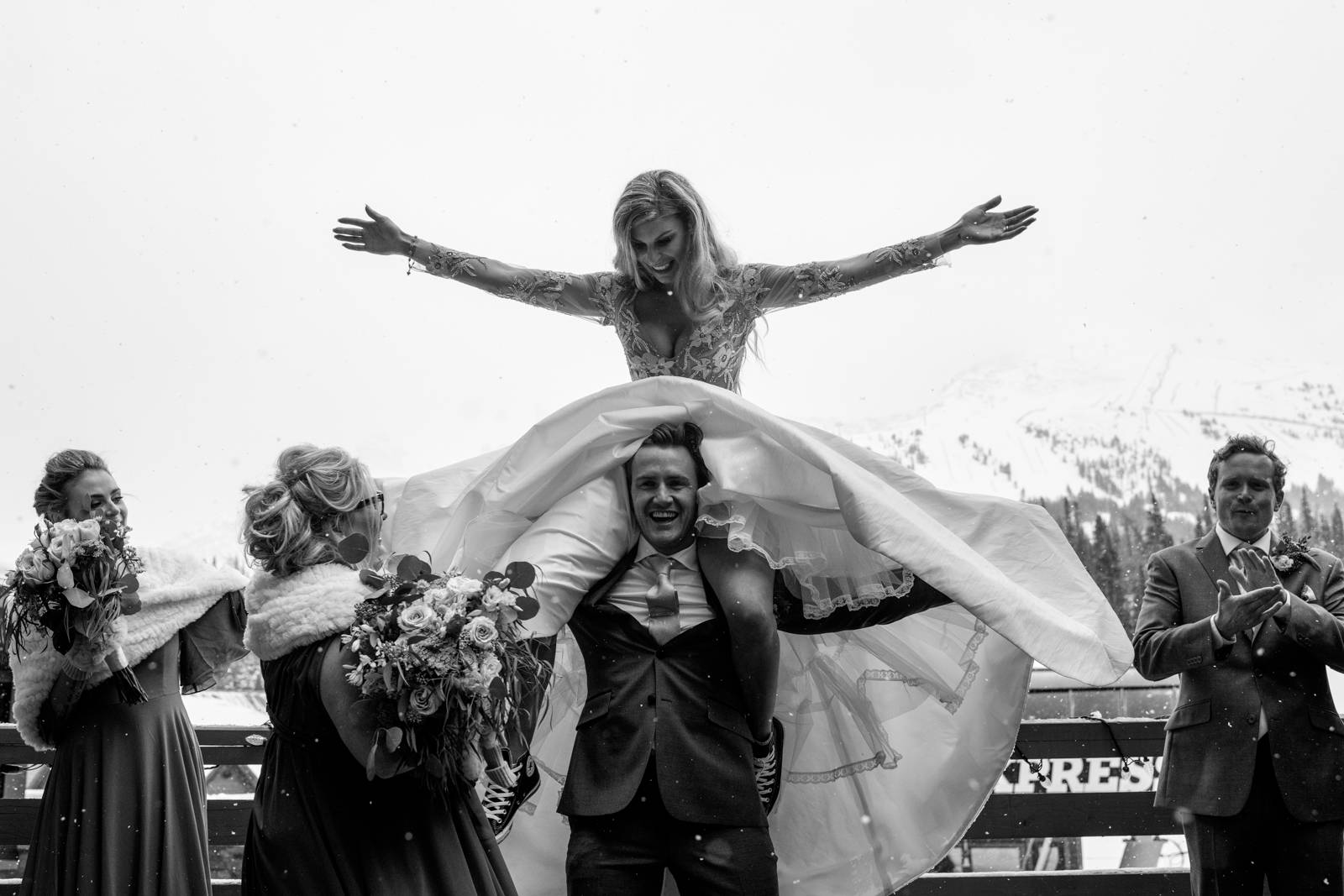 groom holding the bride