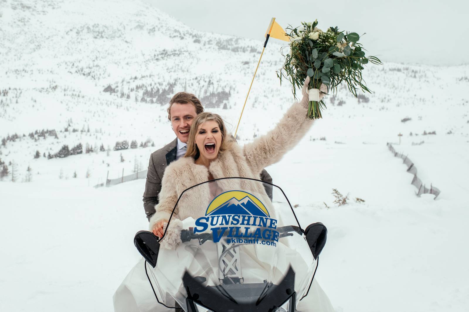 bride and groom having fun at the Sunshine Village