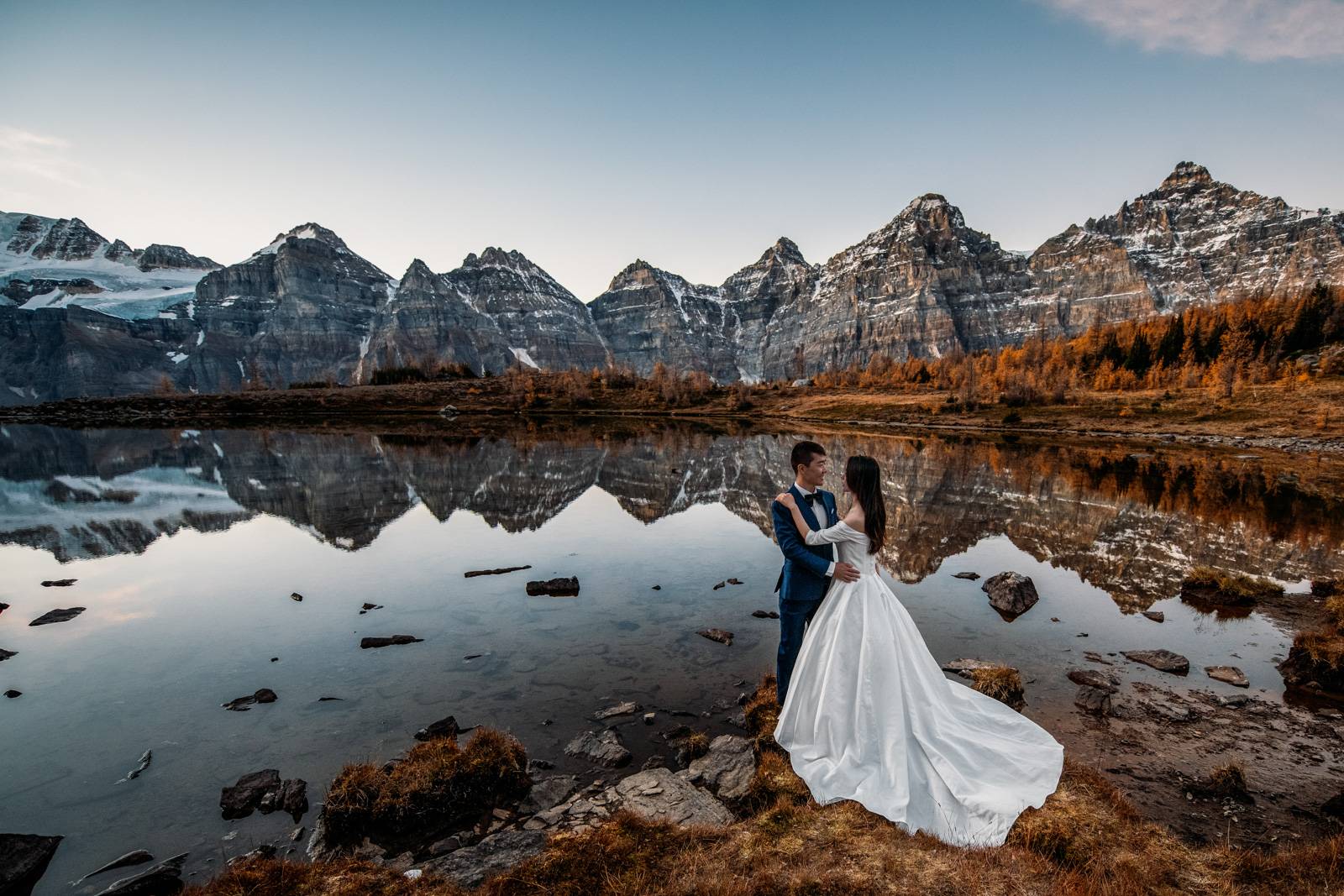bride hugs groom in Banff National Park