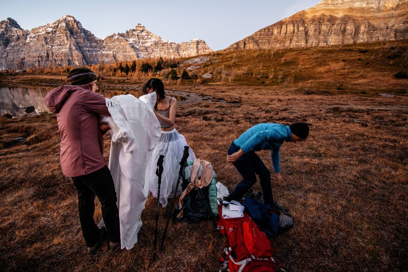 Bride changing to her wedding dress