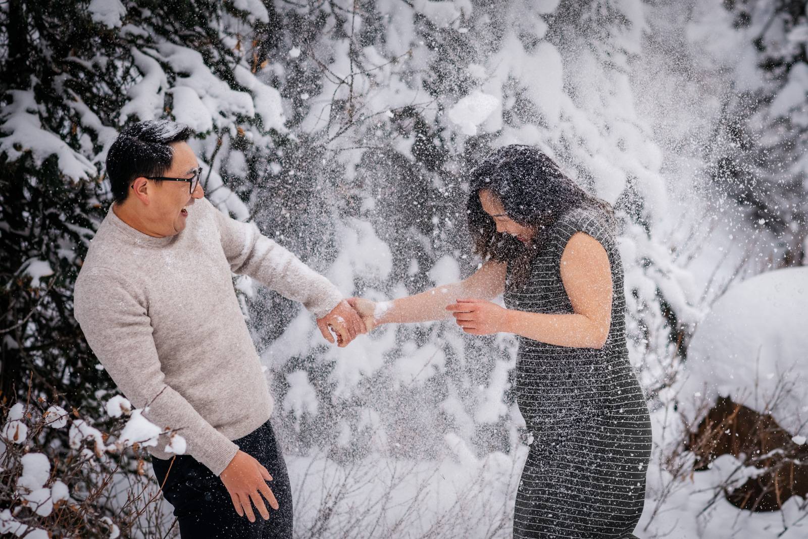 Winter maternity photo session at Lake Louise in Banff National Park., Amy  + Zhendan