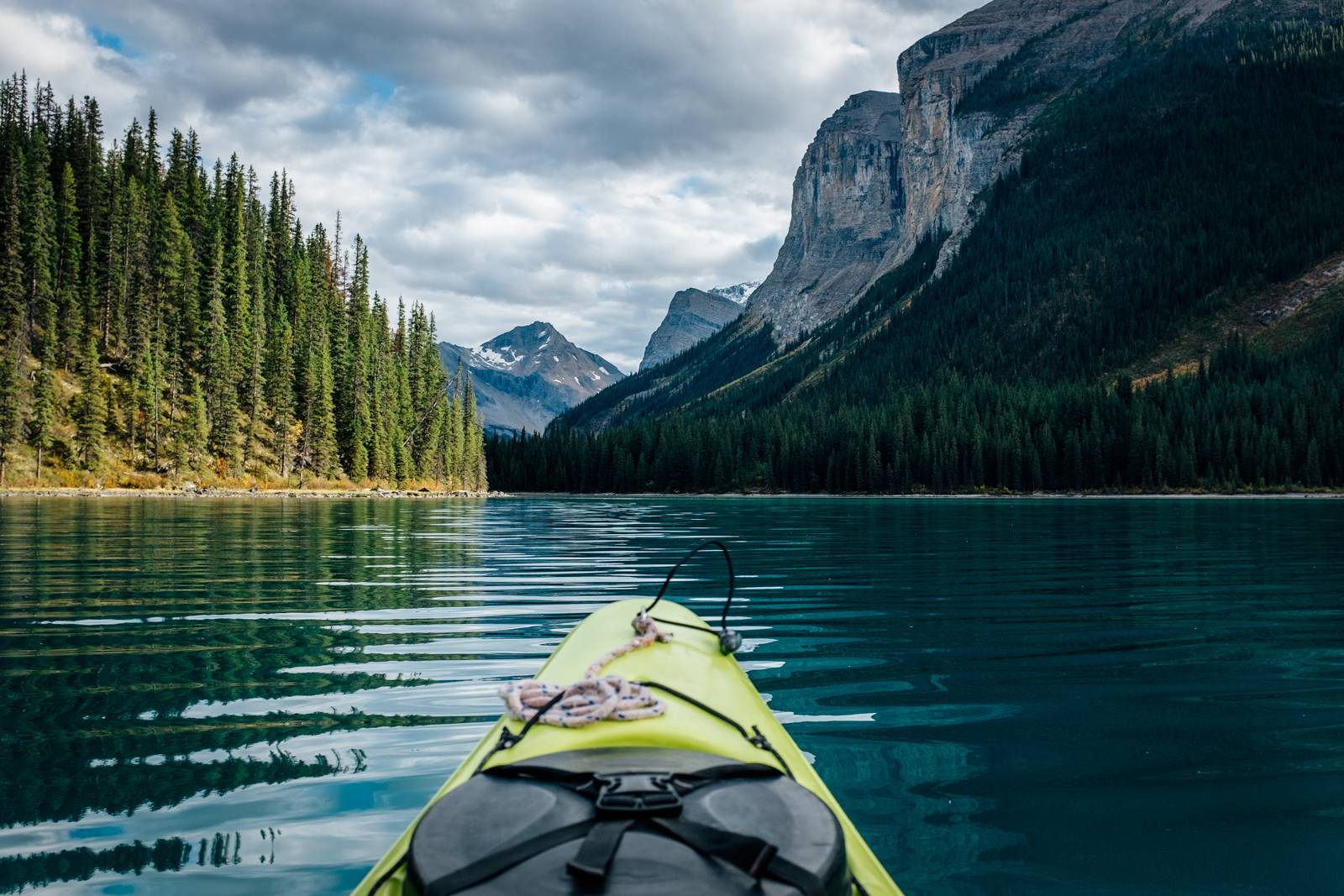 green kayak and the Maligne Lake