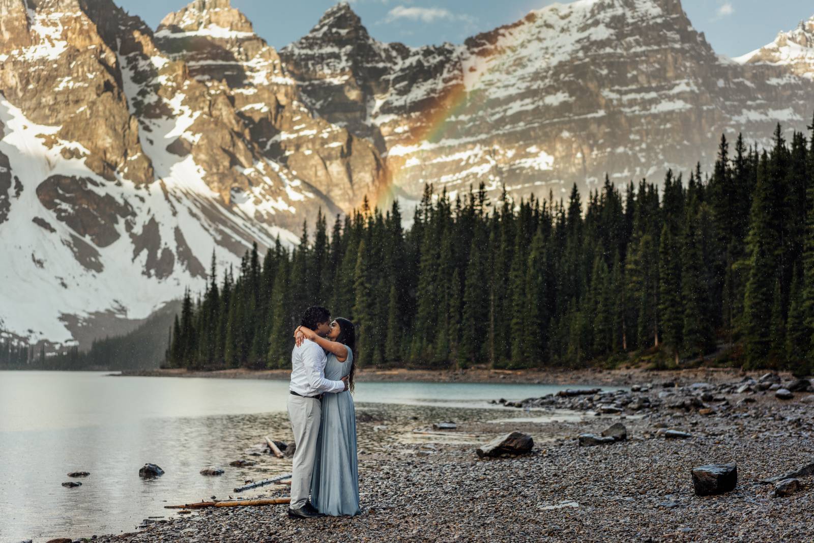 romantic kiss and rainbow at moraine lake