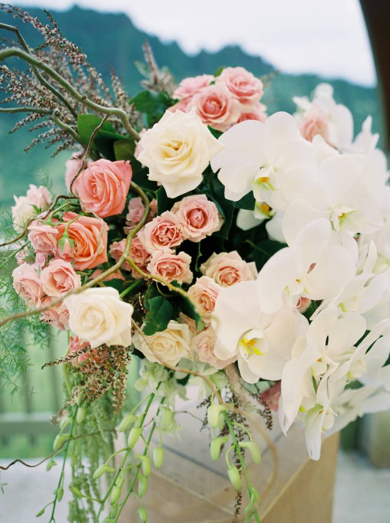 romantic blush and ivory color palette ceremony flower arrangements
