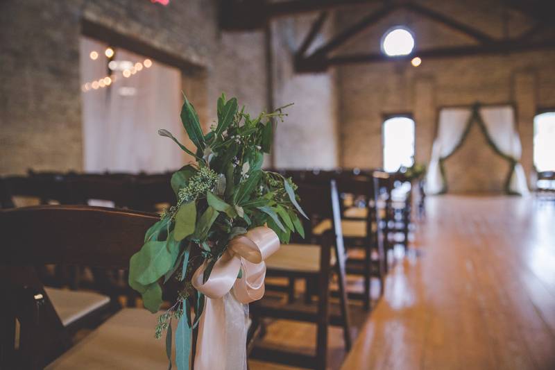 chair floral, chair flowers, wedding greenery, seeded eucalyptus