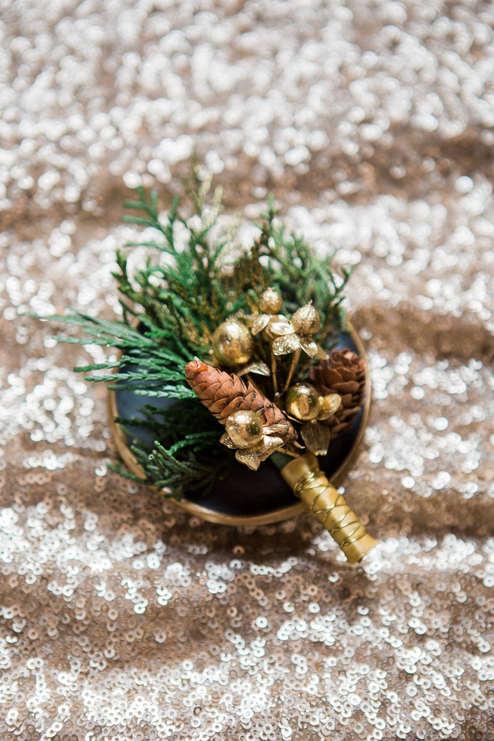 gold berries evergreen boutonniere