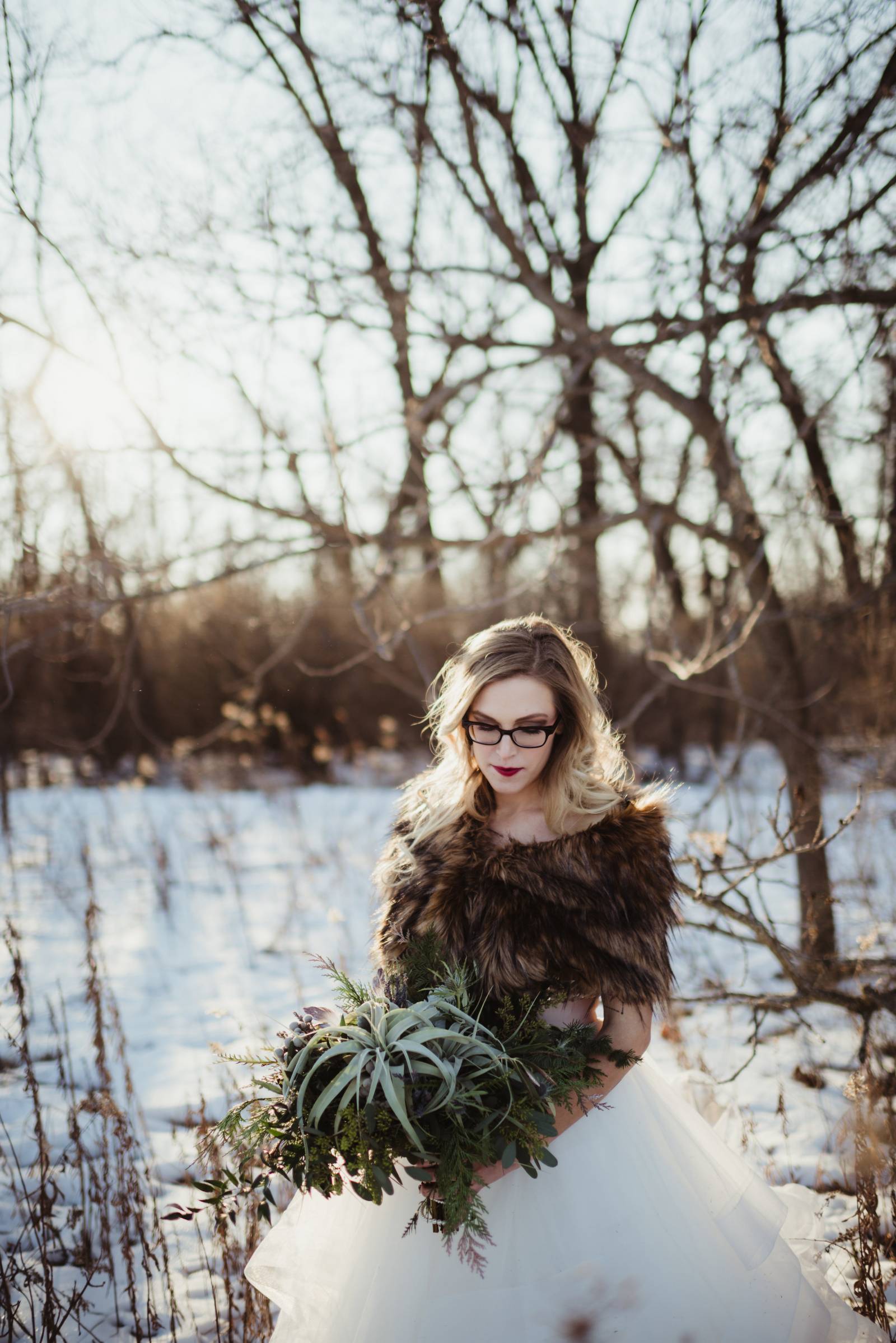 winter wedding, snowy winter wedding, winter woods snowy bridal photos, faux fur shawl, winter brida