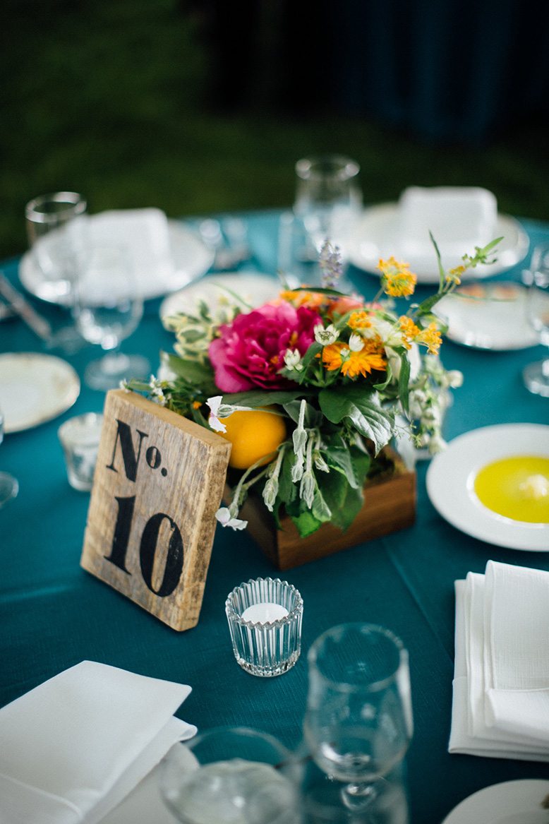 farm chic bright wedding tablescape, table setting wedding reception decor table centerpieces flower