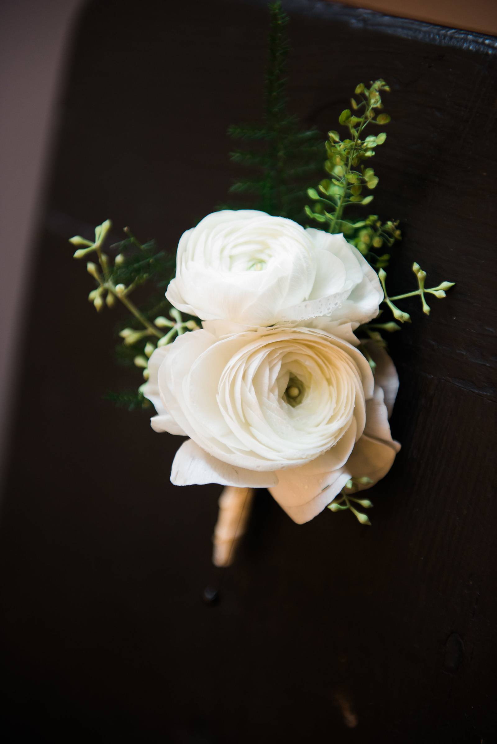 white flowers floral boutonniere