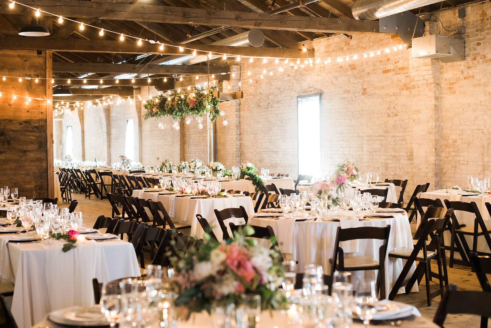 industrial warehouse wedding reception wisconsin cafe lighting table seating ideas