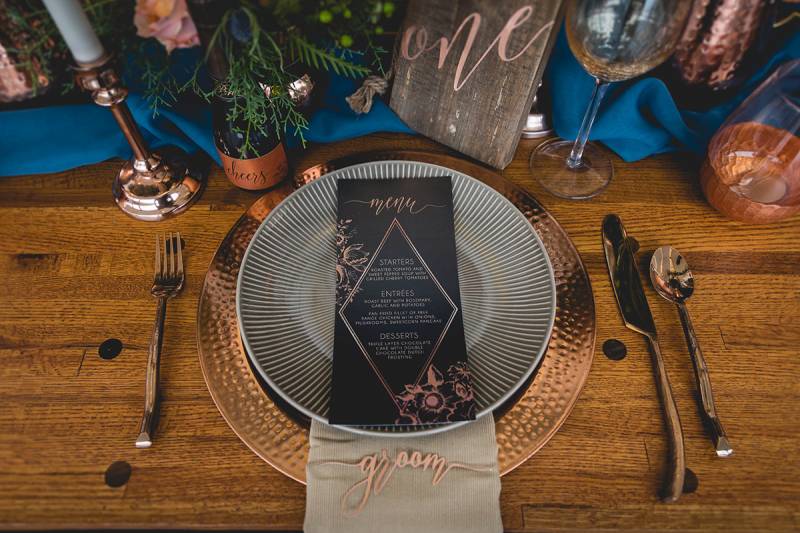 moody lux copper grey gray table setting, plates, chargers, menu, table number, mini champagne bottl