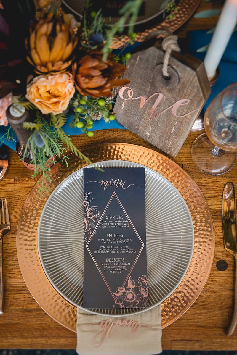 table setting, tablescape, copper grey gray plates chargers, table number, centerpieces