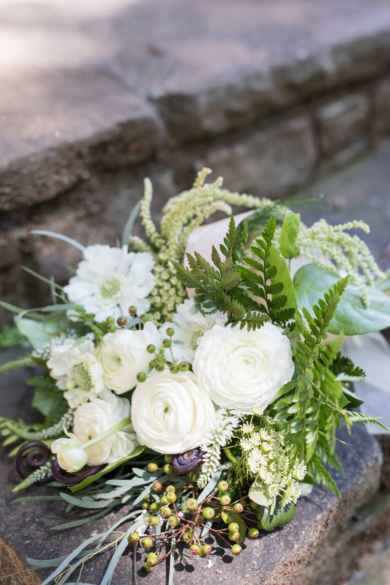 white wedding bridal bouquet ferns greenery wildly looking flowers