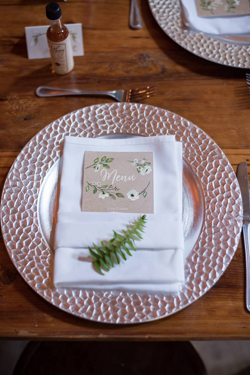 wedding chargers table setting fern greenery place card mini bourbon whiskey bottle wedding favors