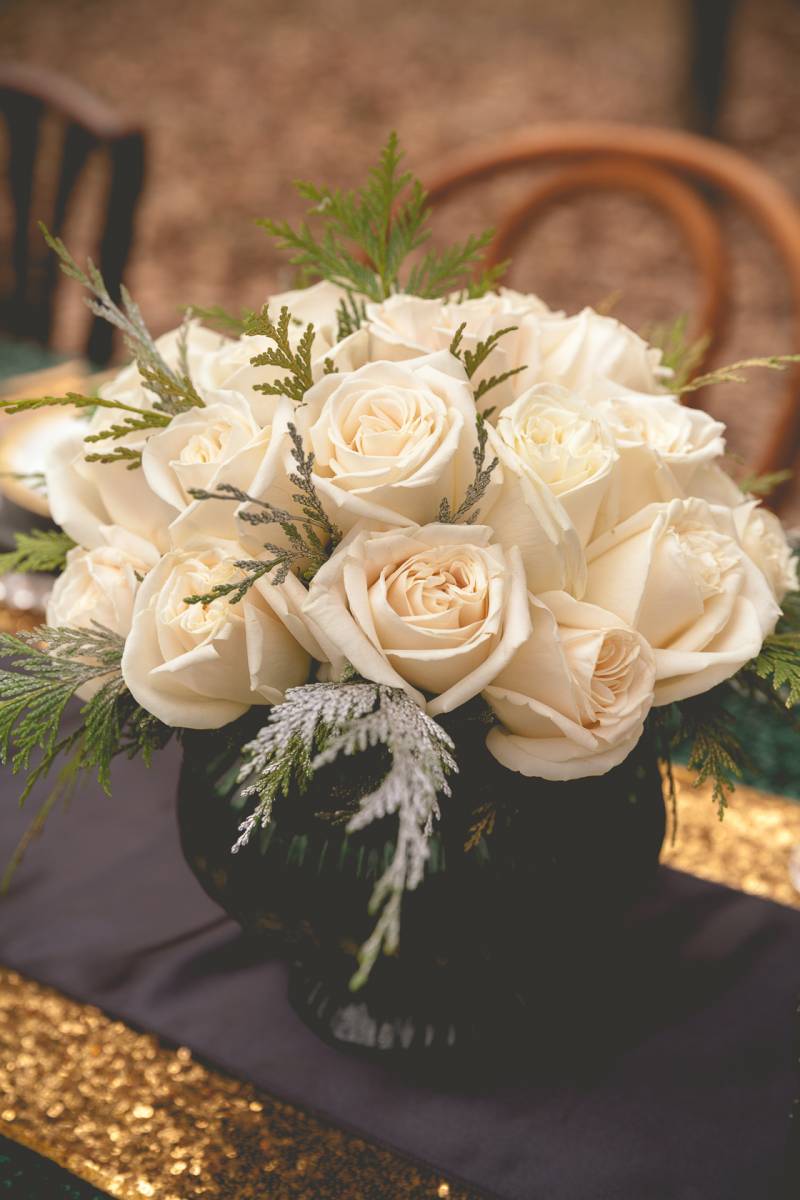 white floral centerpieces, white roses