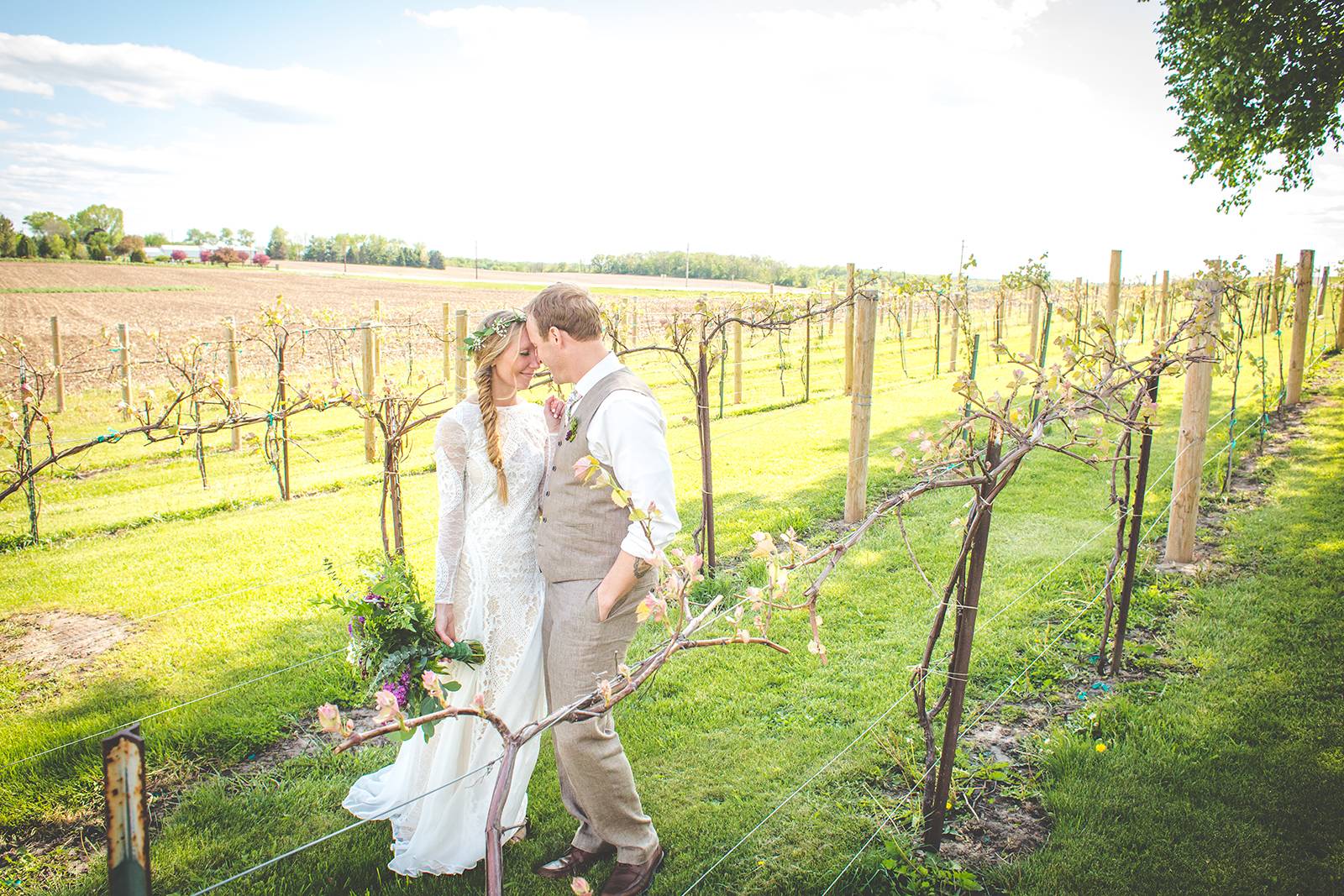 winery vineyard wedding portrait sessions , over the vines wedding venue reception