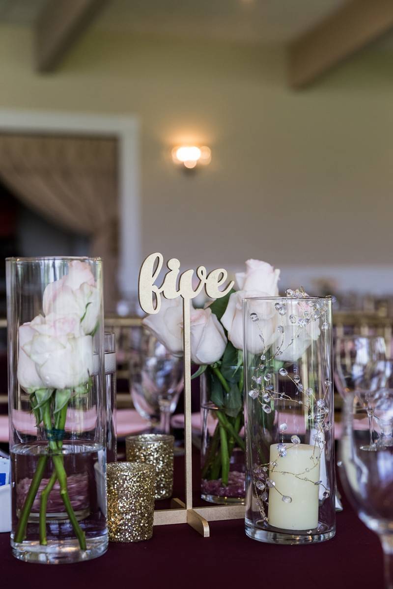table numbers, calligraphy gold laser cut table numbers, white floral centerpieces