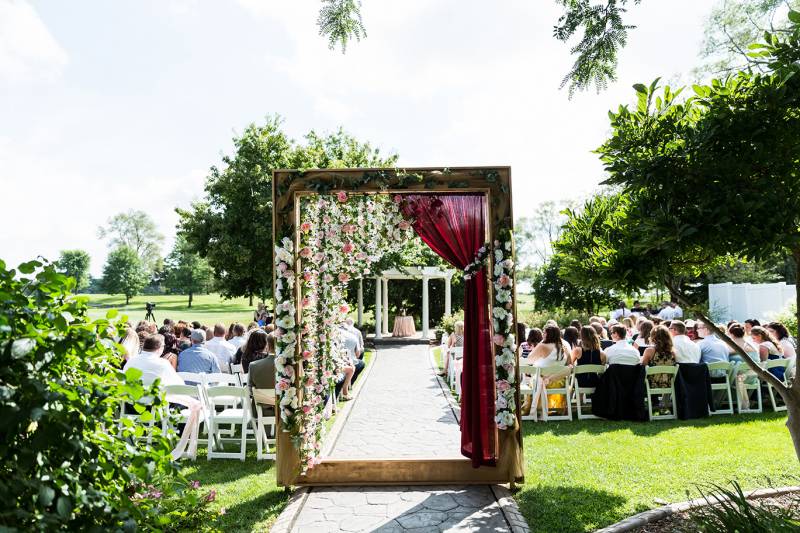 ceremony decor ideas, ceremony entrance frame, hanging floral installation, outdoor ceremony