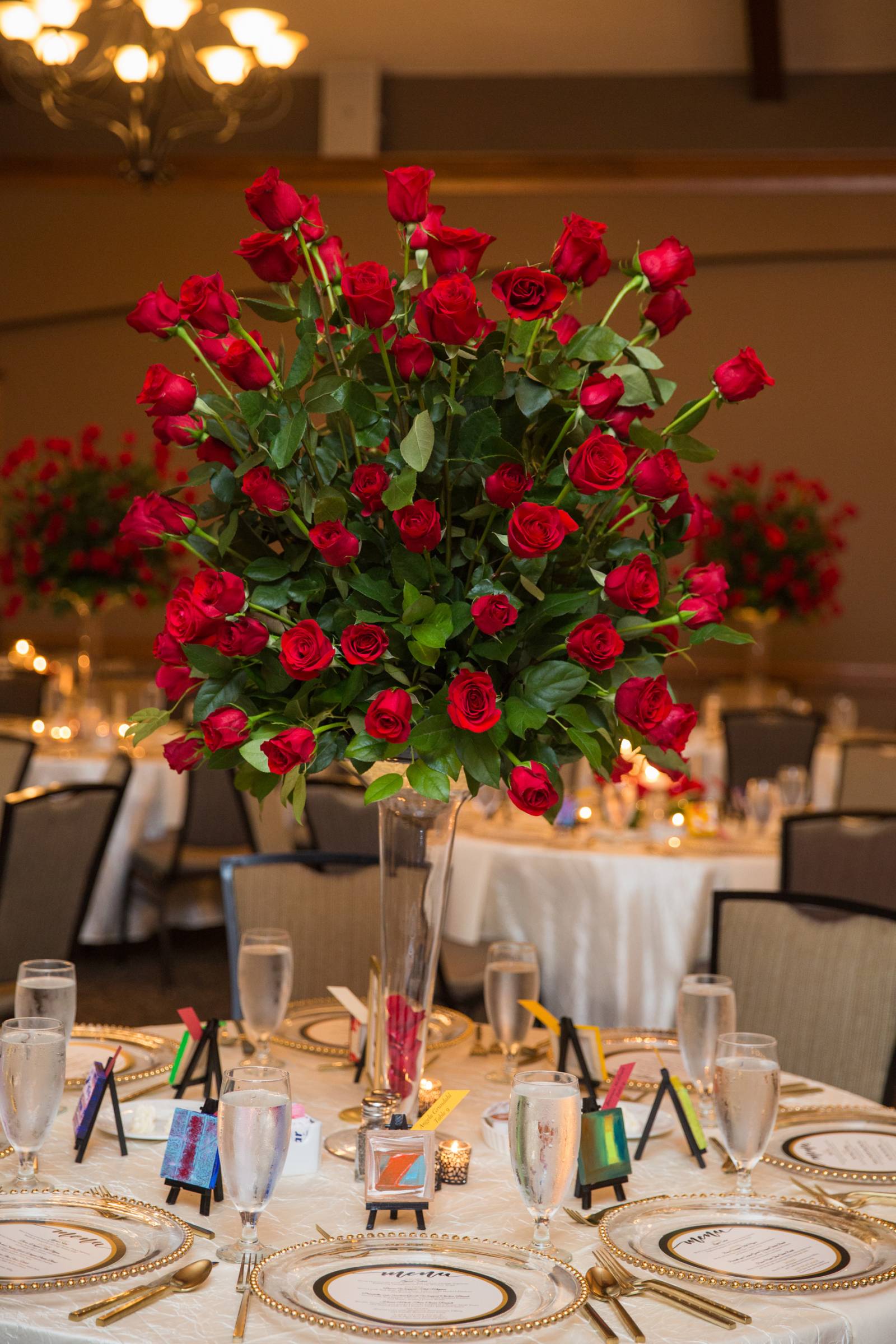 red centerpieces, red flowers, red floral, red roses, reception table decor, tall high centerpieces