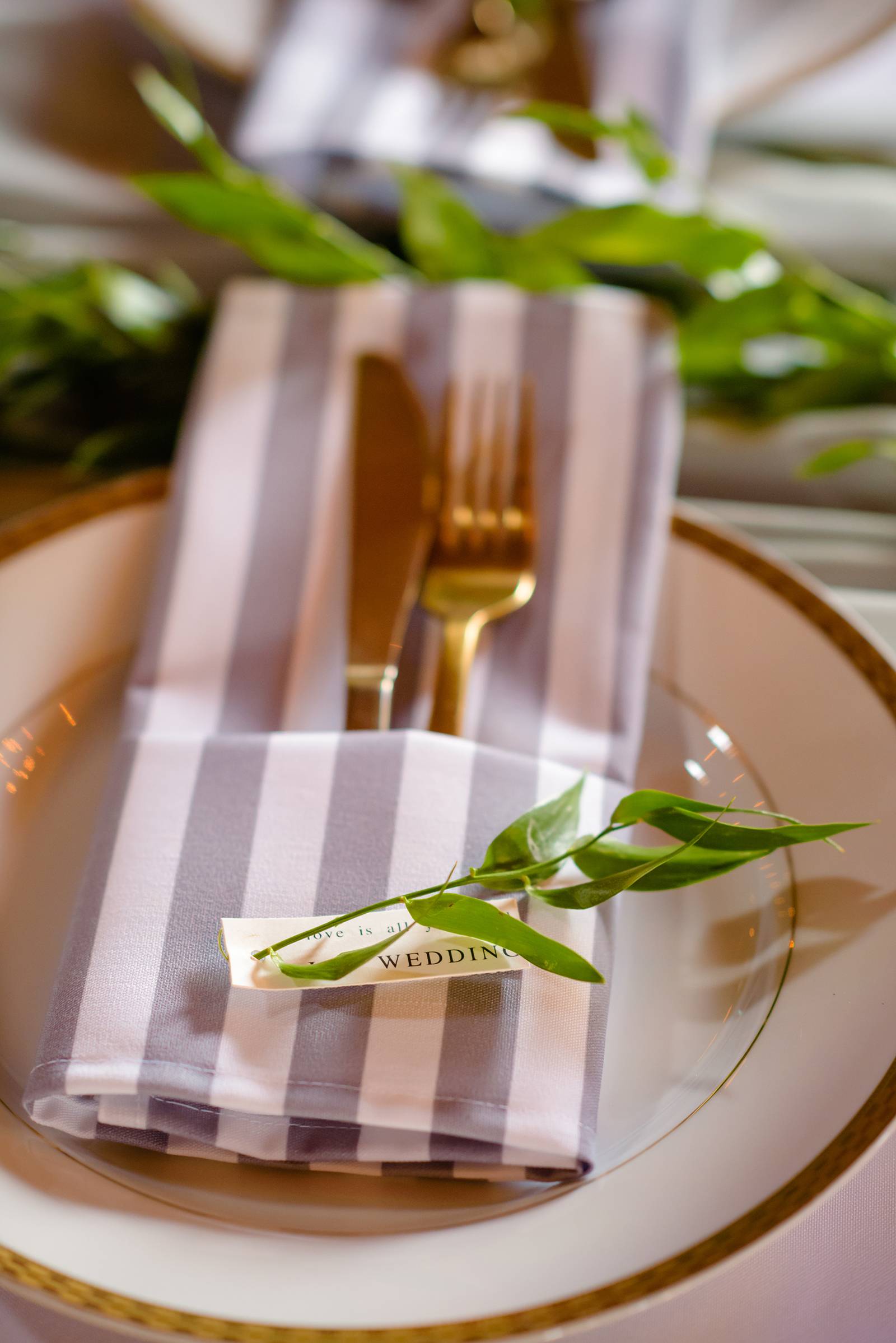 table setting, place setting, grey gray linen napkins, greenery, stripe napkins, place cards, floral