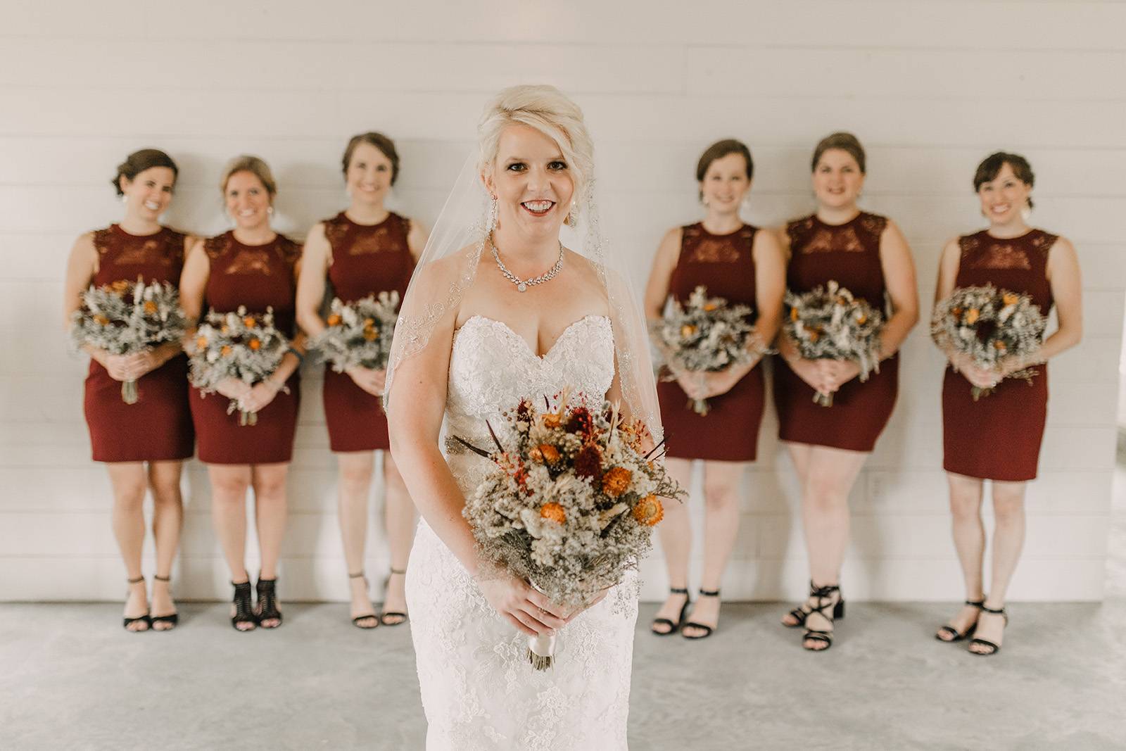 crimson burgundy bridesmaid dresses, bouquet, flowers, floral, dried floral bouquet