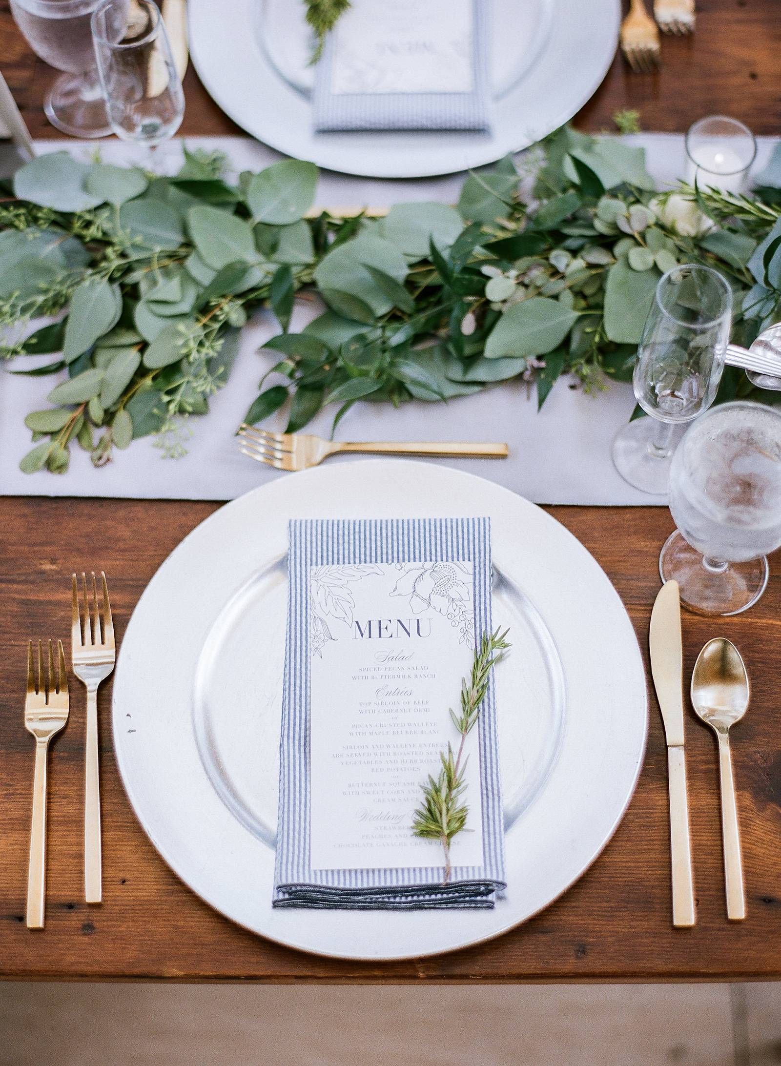 greenery, silver blue table setting, gold flatware