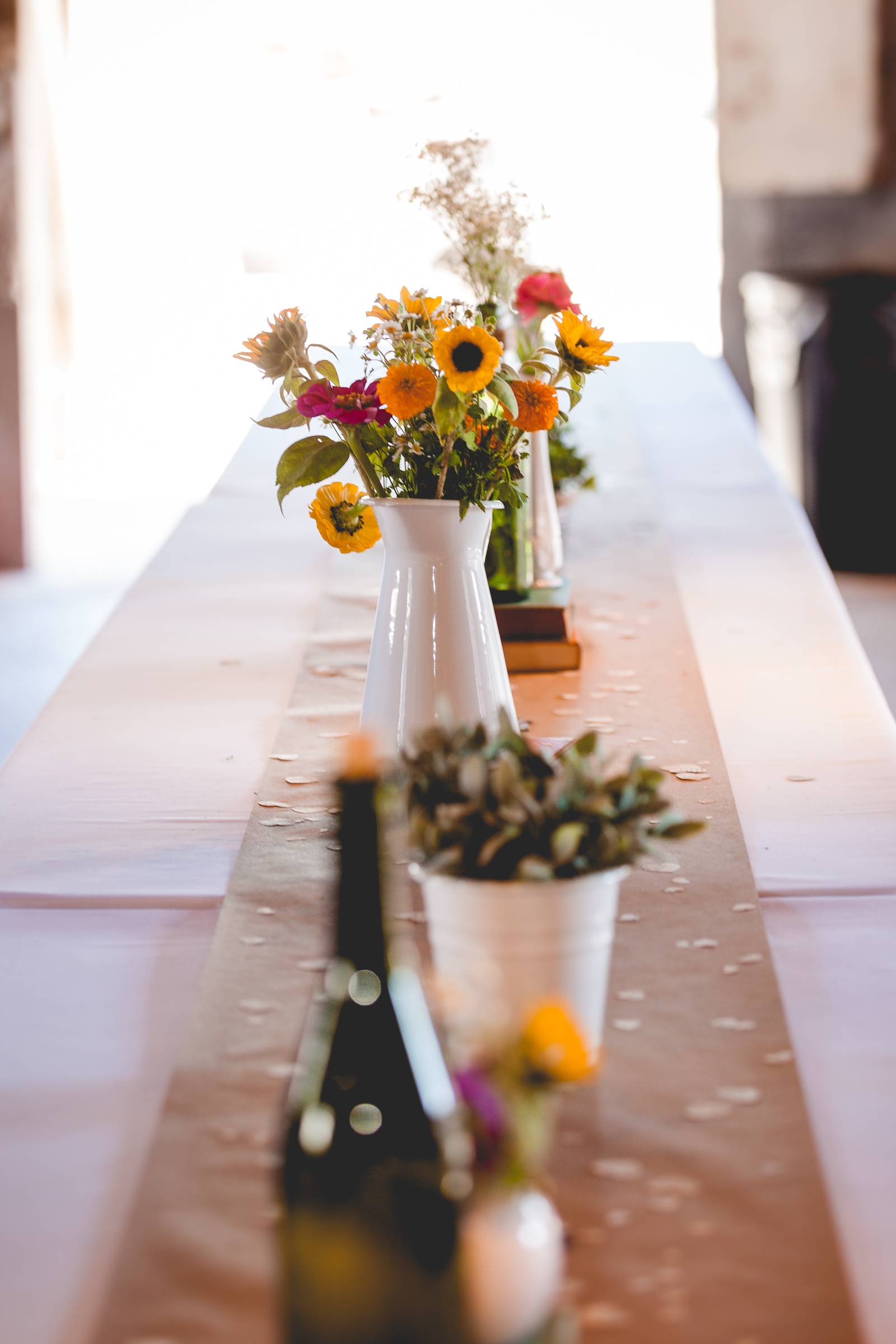 simple rustic centerpiece, centerpieces, white vases, potted plants wedding flowers