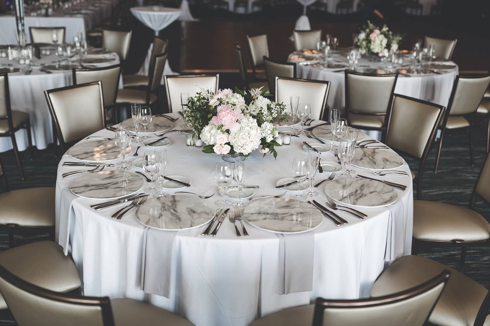modern luxury wedding table settings, marble wedding charger plates, draped napkin folds