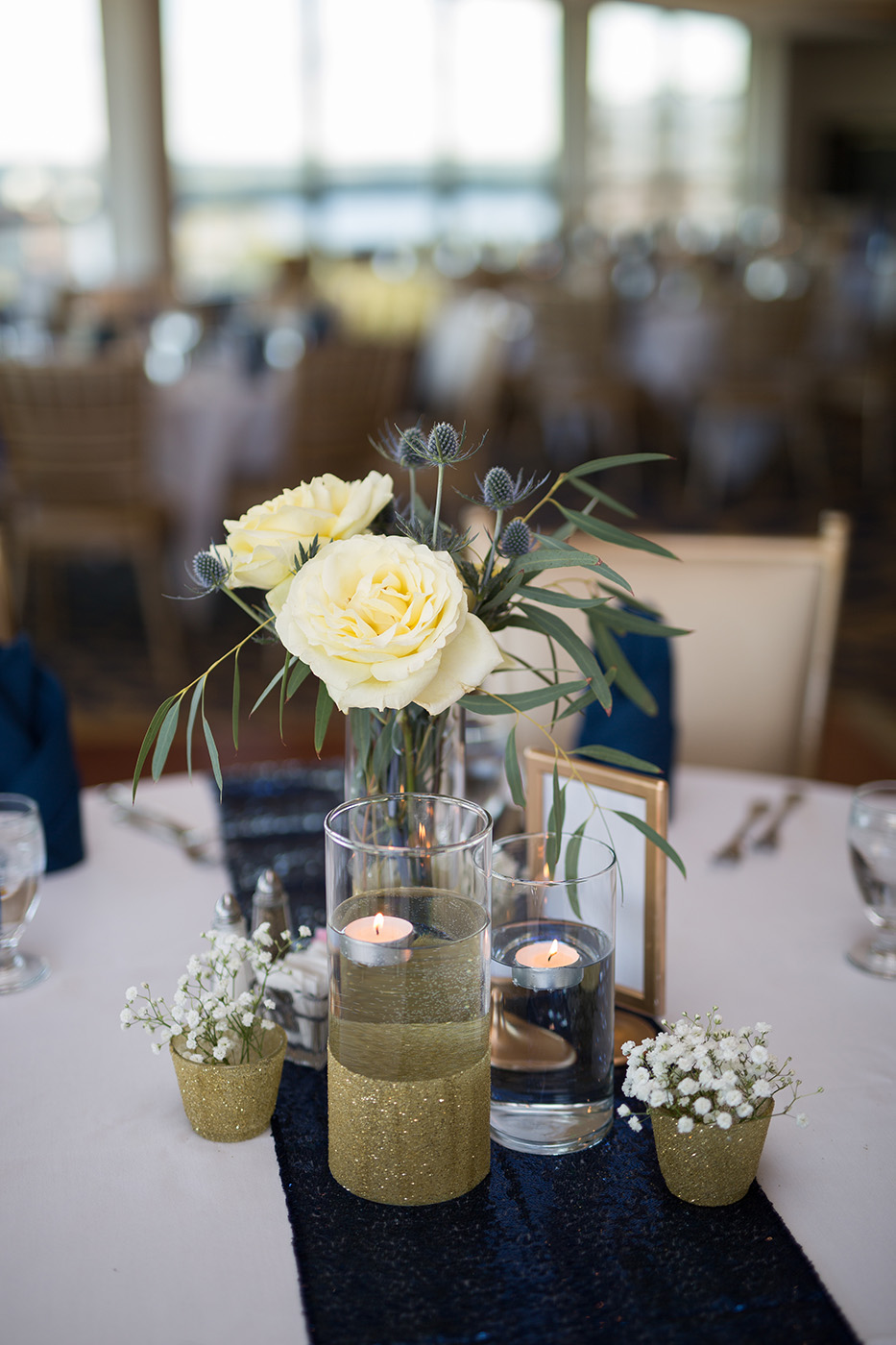 white rose thistle centerpieces