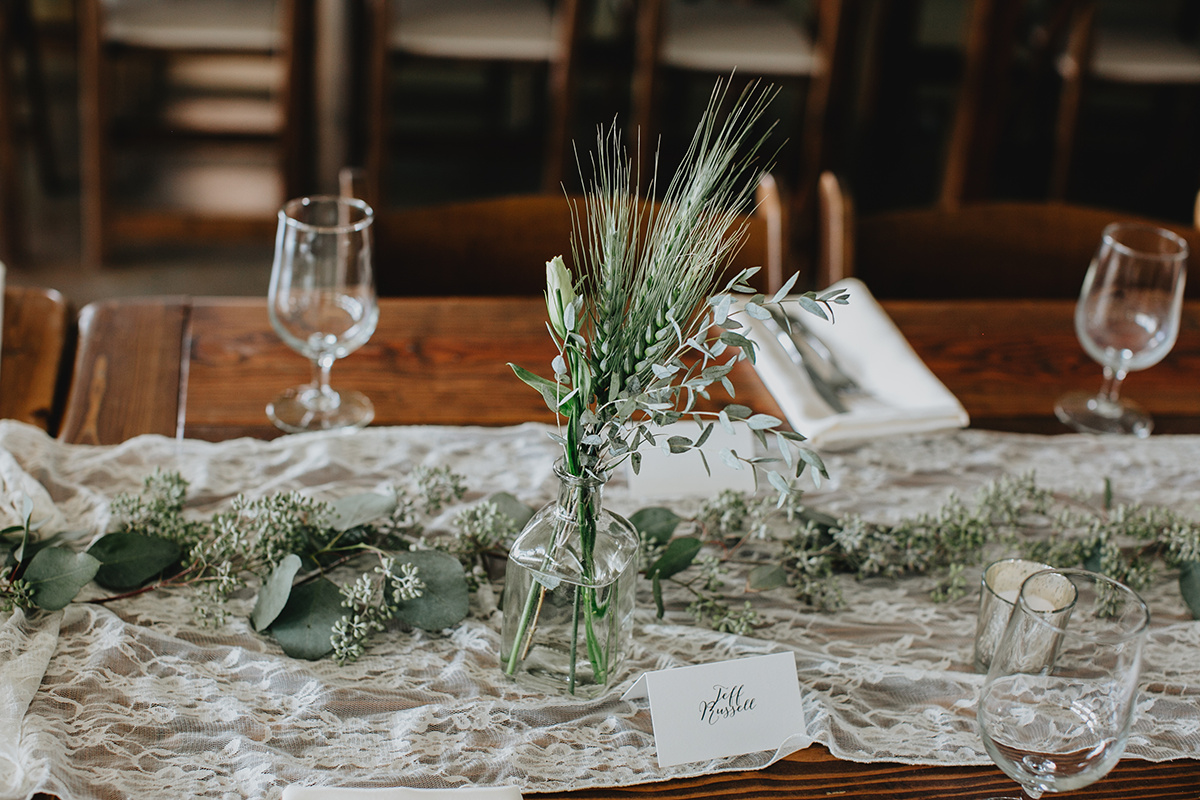 greenery centerpieces, lace table runner