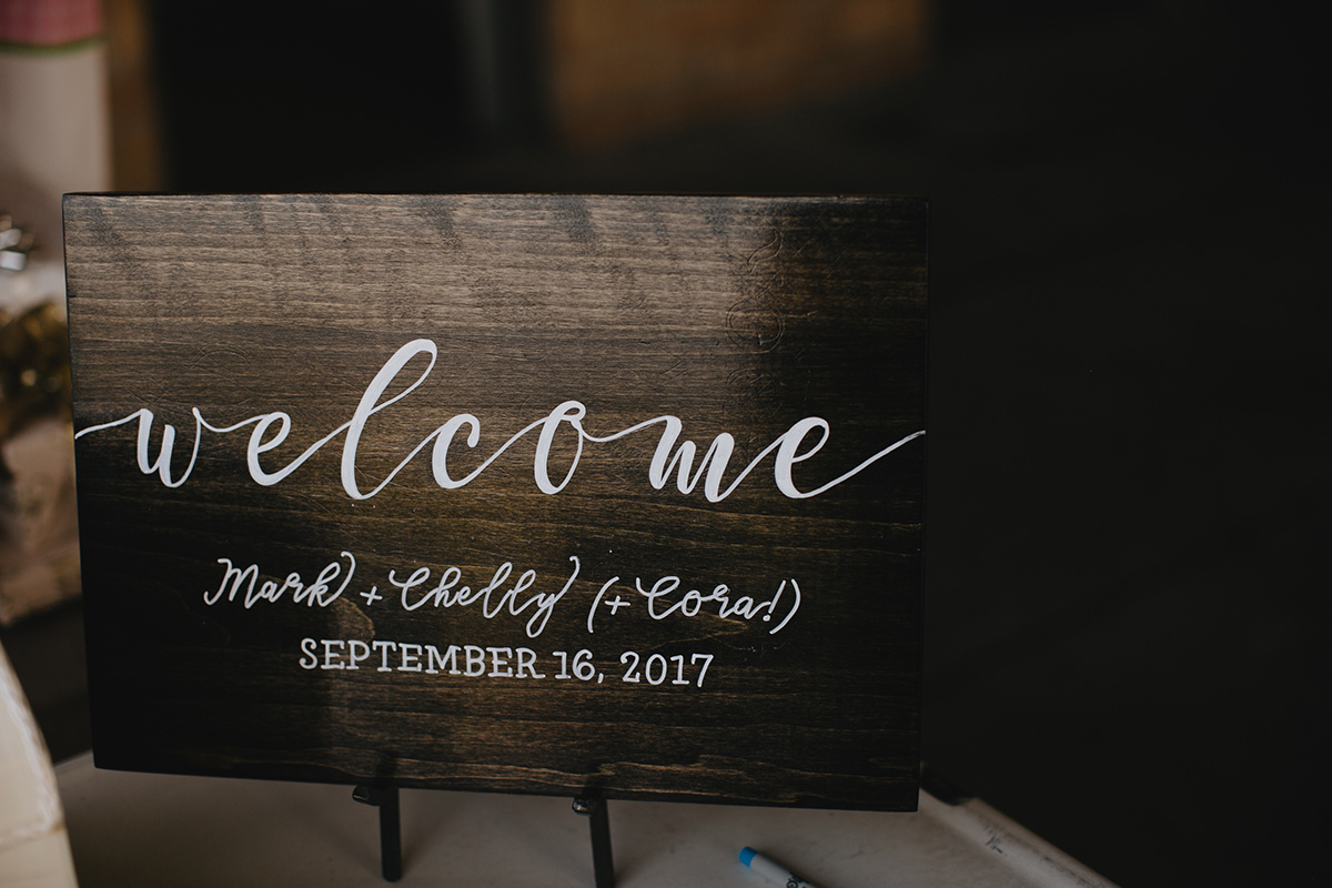 welcome wood sign calligraphy