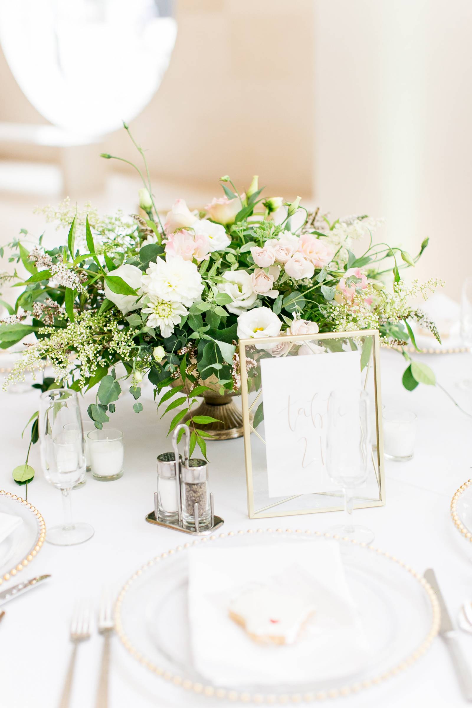 elegant wedding flower centerpieces, gold table numbers