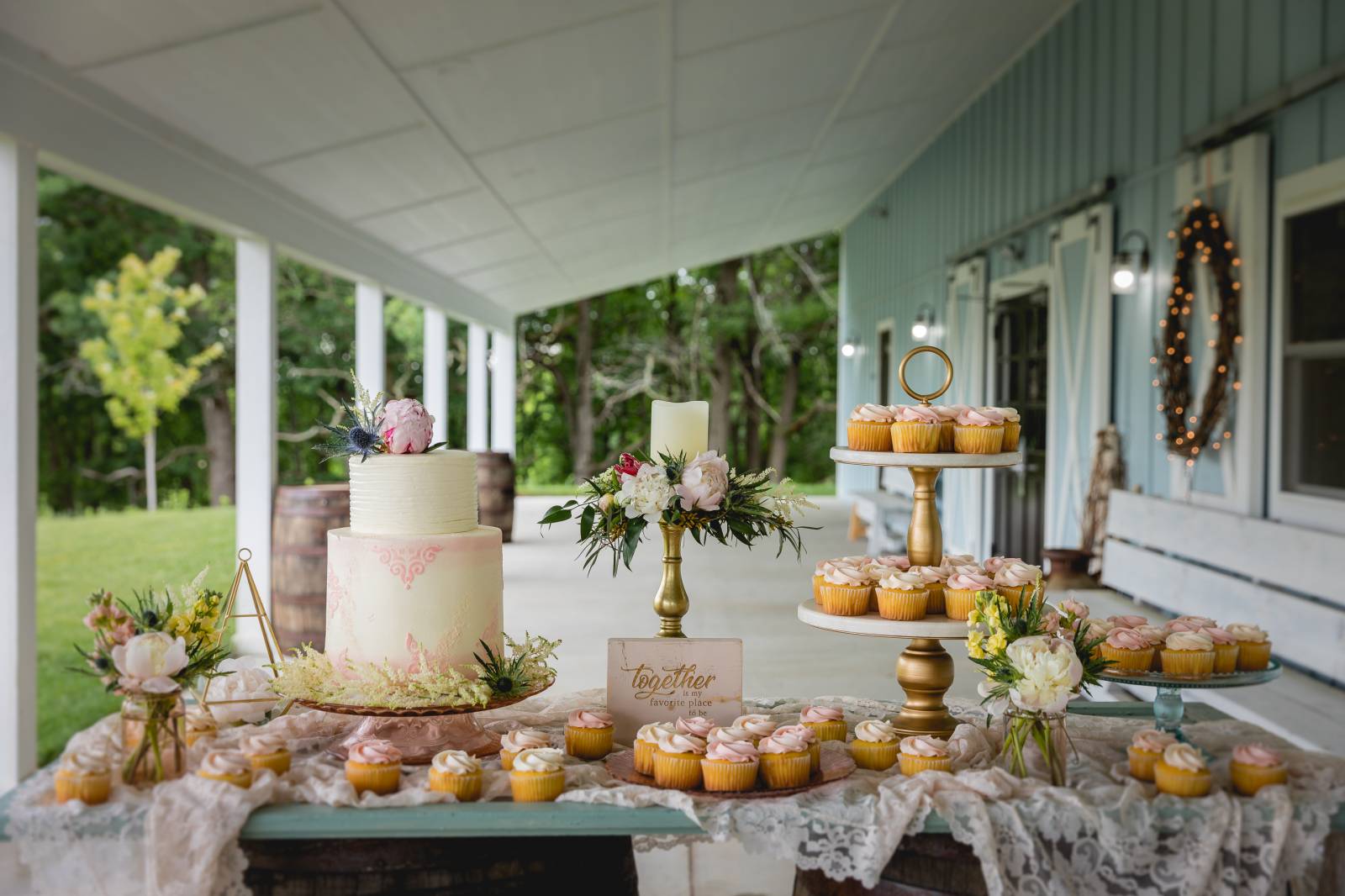 blush wedding cake dessert station